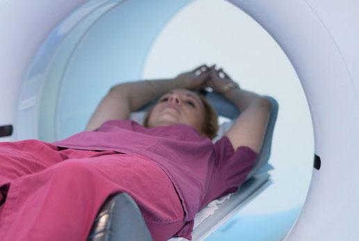 PET CT laying on scanner